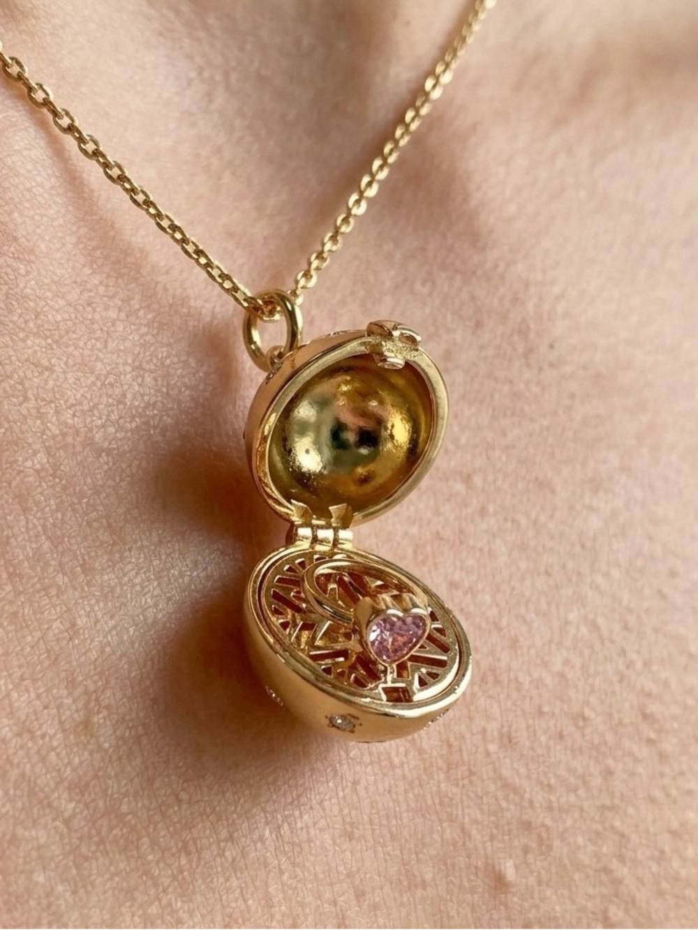 Gold Locket Necklace with Pink Gemstone